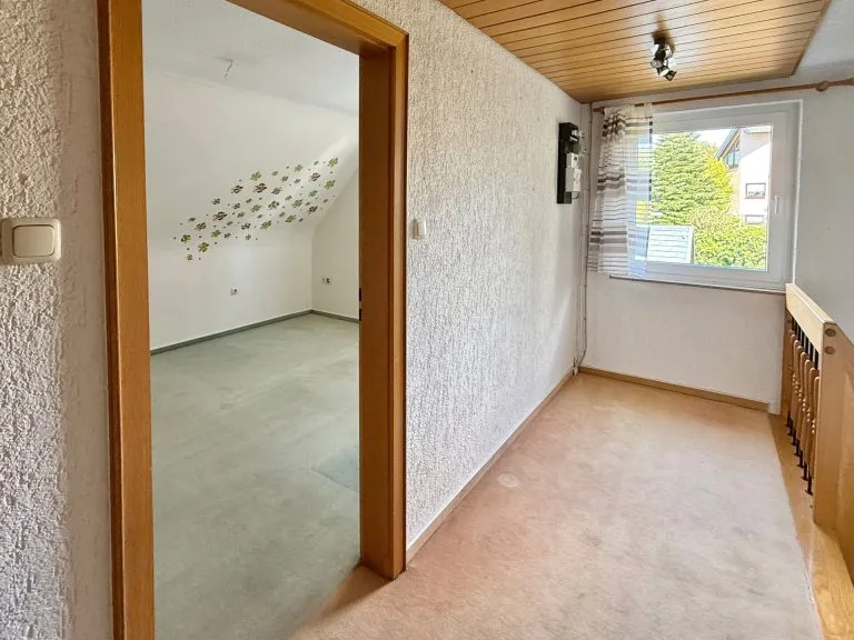 Immobilienangebot - Zinhain - Alle - Traumhafter Ausblick, stadtnahe Lage: Einfamilienhaus für Paare & Kleinfamilien!