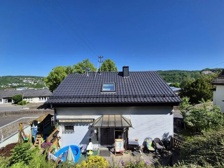 Immobilienangebot - Wissen - Alle - Modernisiertes Einfamilienhaus mit Garten und Garage in guter Zentrumslage!