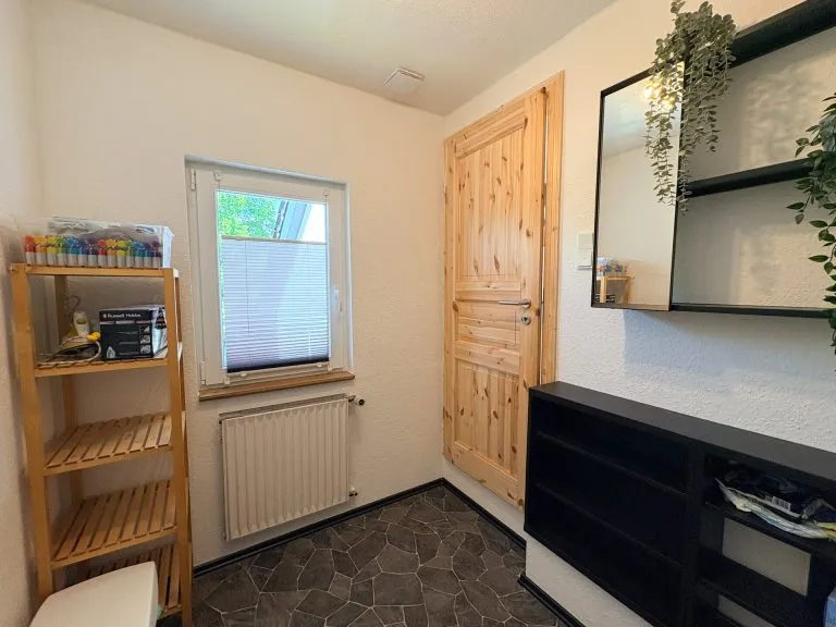 Immobilienangebot - Wissen - Alle - Modernisiertes Einfamilienhaus mit Garten und Garage in guter Zentrumslage!
