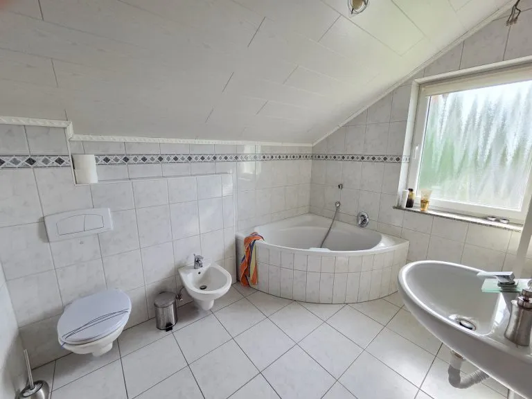 Immobilienangebot - Wölmersen - Alle - *RESERVIERT* Verklinkertes Einfamilienhaus mit Wintergarten, Garage und Garten in ruhiger Wohnlage!