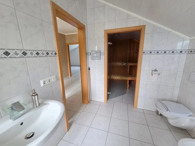 Immobilienangebot - Wölmersen - Alle - *RESERVIERT* Verklinkertes Einfamilienhaus mit Wintergarten, Garage und Garten in ruhiger Wohnlage!