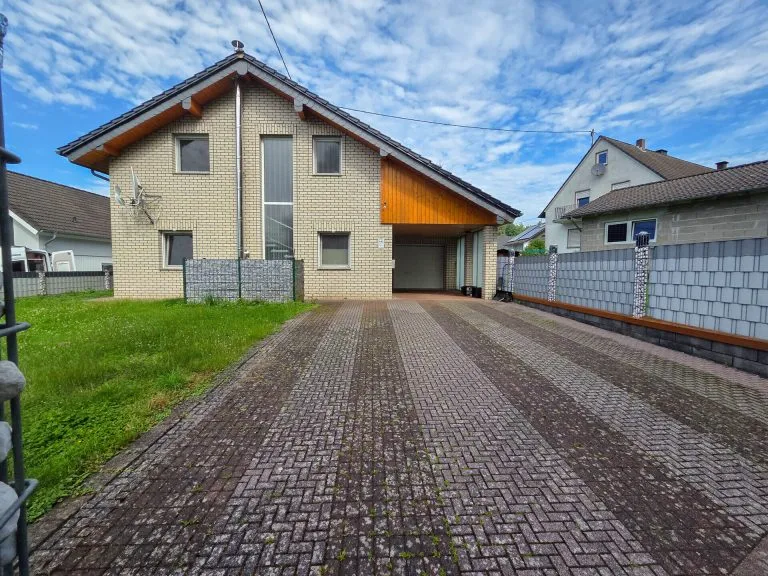 Immobilienangebot - Wölmersen - Alle - *RESERVIERT* Verklinkertes Einfamilienhaus mit Wintergarten, Garage und Garten in ruhiger Wohnlage!