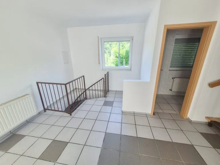 Immobilienangebot - Döttesfeld - Alle - Gepflegtes Reihenmittelhaus mit cleverem Eigentumskonzept und Garage - nähe Puderbach!