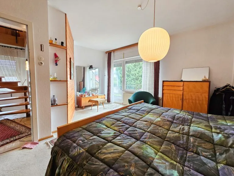 Immobilienangebot - Bonn - Alle - Einfamilienhaus mit bebaubarem Grundstück und Entwicklungspotenzial in Bonn-Beuel (Holzlar)
